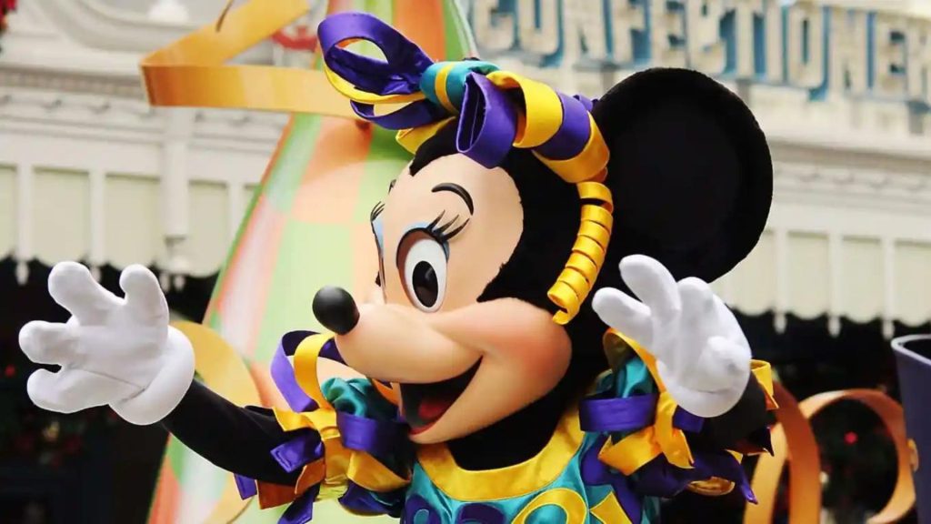 Minnie Mouse on Main Street during a parade at Disney's Magic Kingdom Park at Walt Disney World