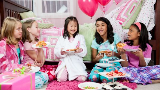 girls Eating at a sleepover party