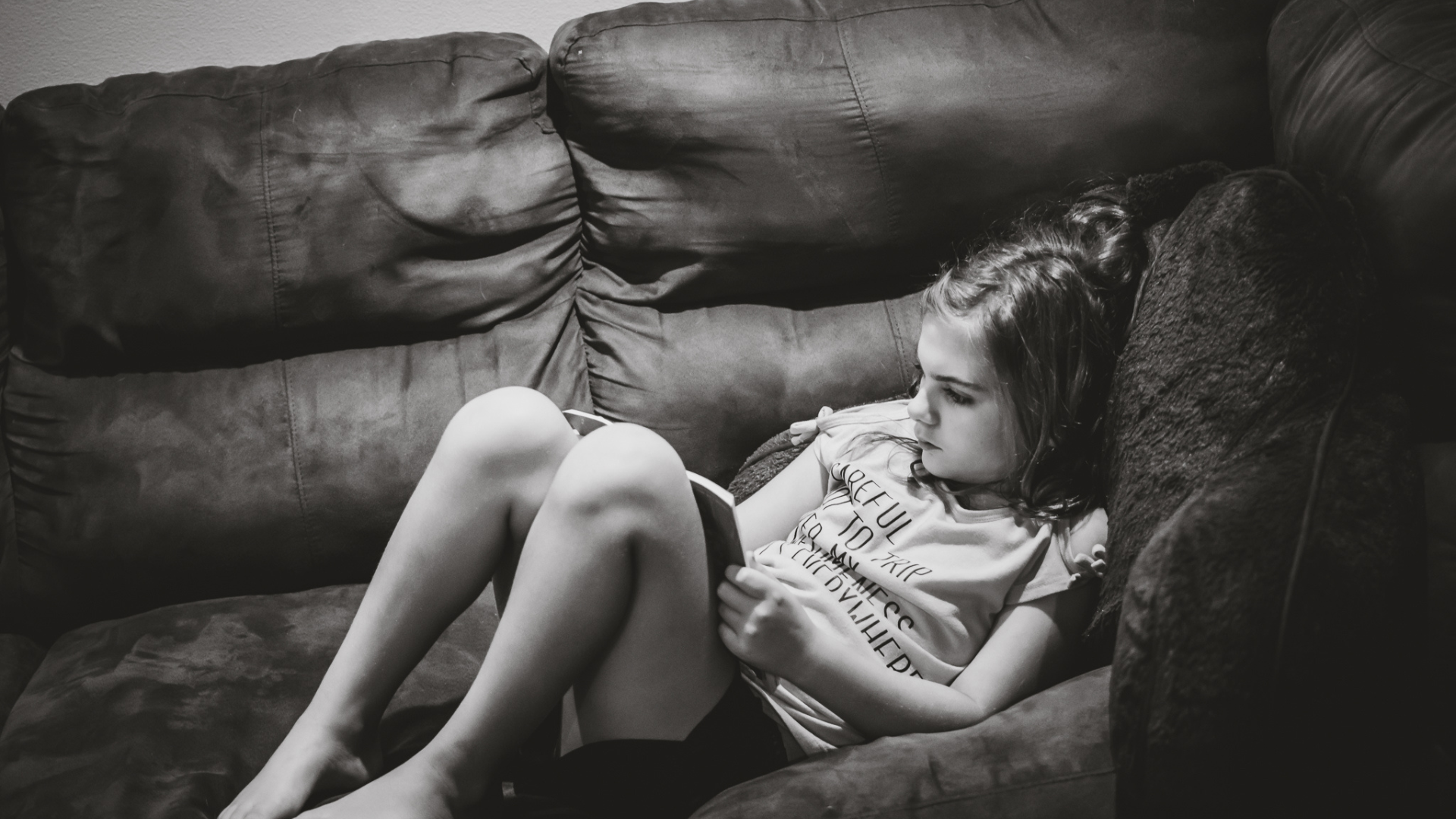 homeschooled child reading a book in New ORleans